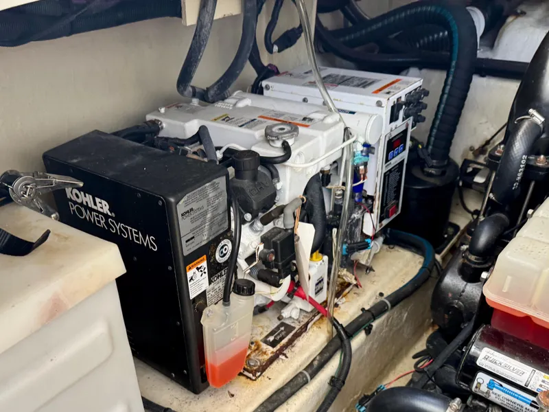 Slide: The Image of Engine room of 2009 Sea Ray 350 Sundancer with Kohler power systems generator. - 19