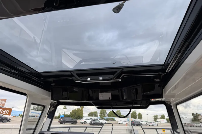 Slide: The Image of Interior view of 2026 Navan C30 with panoramic sunroof and modern design. - 24