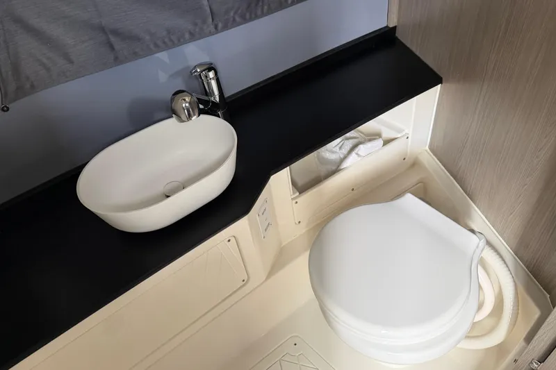 Slide: The Image of Modern bathroom in 2026 Navan C30 with sleek sink and toilet design. - 28