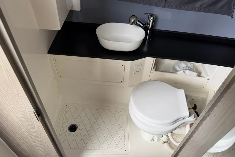 Slide: The Image of Modern bathroom in 2026 Navan C30 with sleek sink and compact toilet design. - 29