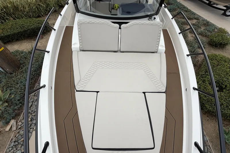 Slide: The Image of 2026 Navan C30 boat with cushioned seating and sleek design. - 39