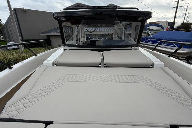 Slide: The Image of 2026 Navan C30 boat with luxurious beige seating and sleek design. - 42