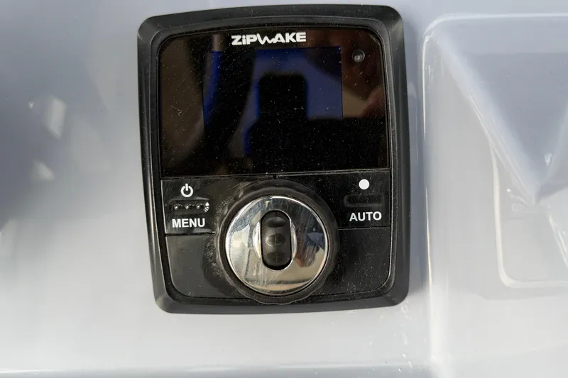 Slide: The Image of Zipwake control panel on 2026 Navan C30 boat dashboard. - 43