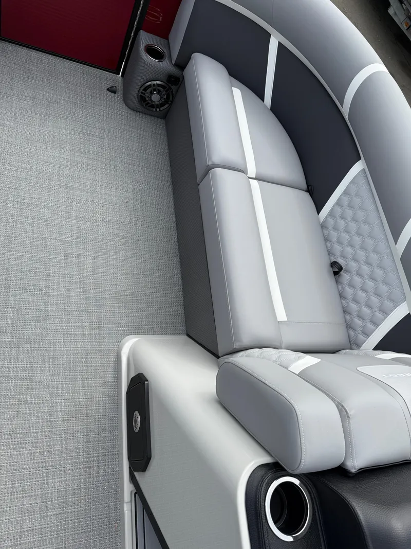 Slide: The Image of 2025 Crest 220 SLRC boat interior with gray seating and modern design. - 18