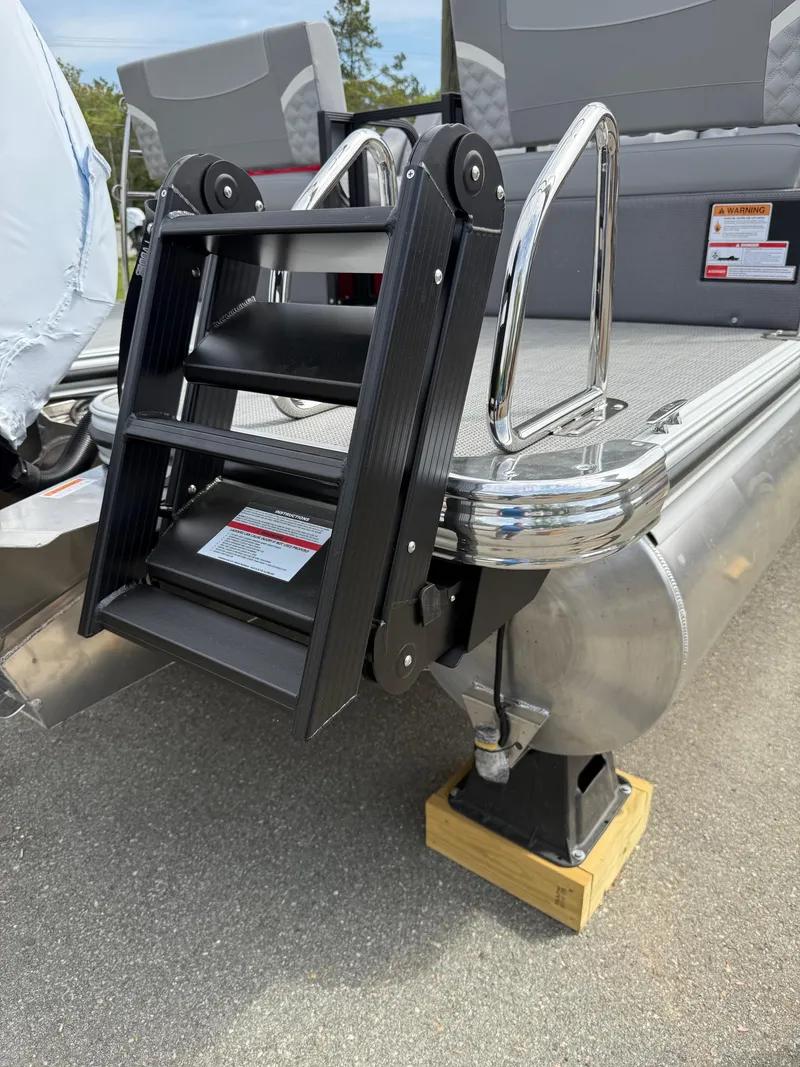 Slide: The Image of 2025 Crest 220 SLRC pontoon boat with a sturdy boarding ladder. - 24