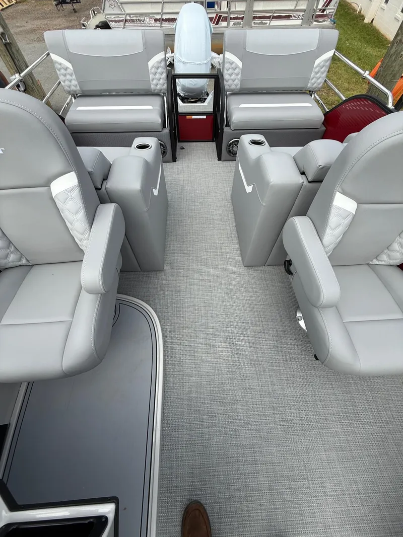 Slide: The Image of 2025 Crest 220 SLRC boat interior with gray seating and modern design. - 9