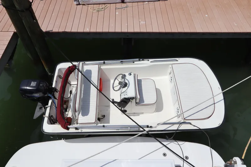 Slide: The Image of 2001 Navigator 4800 CLASSIC boat docked at a marina, aerial view. - 10