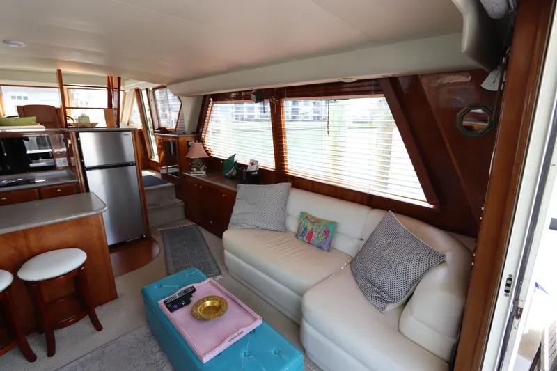 Slide: The Image of Interior of 2001 Navigator 4800 CLASSIC yacht with cozy seating and modern kitchen. - 17