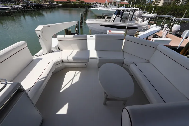 Slide: The Image of Spacious seating area on 2001 Navigator 4800 CLASSIC yacht, docked at marina. - 42