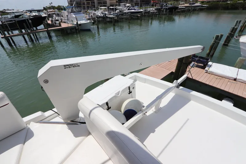 Slide: The Image of 2001 Navigator 4800 CLASSIC yacht deck with davit crane at marina. - 43
