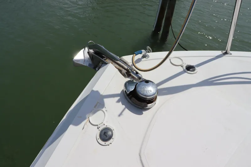 Slide: The Image of Bow of 2001 Navigator 4800 CLASSIC yacht with anchor and winch system. - 5