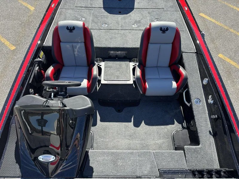 Slide: The Image of 2025 Phoenix 721 ZXL boat interior with dual red and gray seats, steering console. - 14