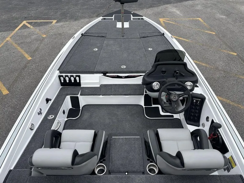 Slide: The Image of 2025 Phoenix 721 ZXL boat interior with dual seats and modern dashboard. - 8