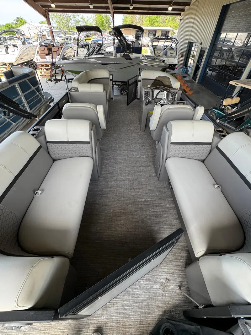 Slide: The Image of 2023 Qwest RLS 820 pontoon boat interior with spacious seating and modern design. - 4