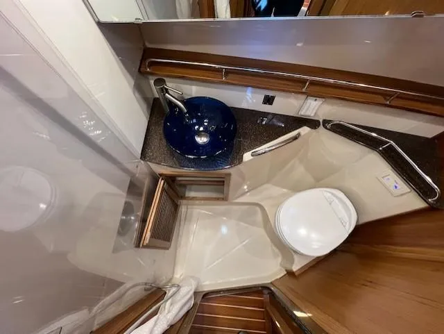 Slide: The Image of 2020 Ranger Tugs R-31 CB bathroom with modern sink and toilet. - 20