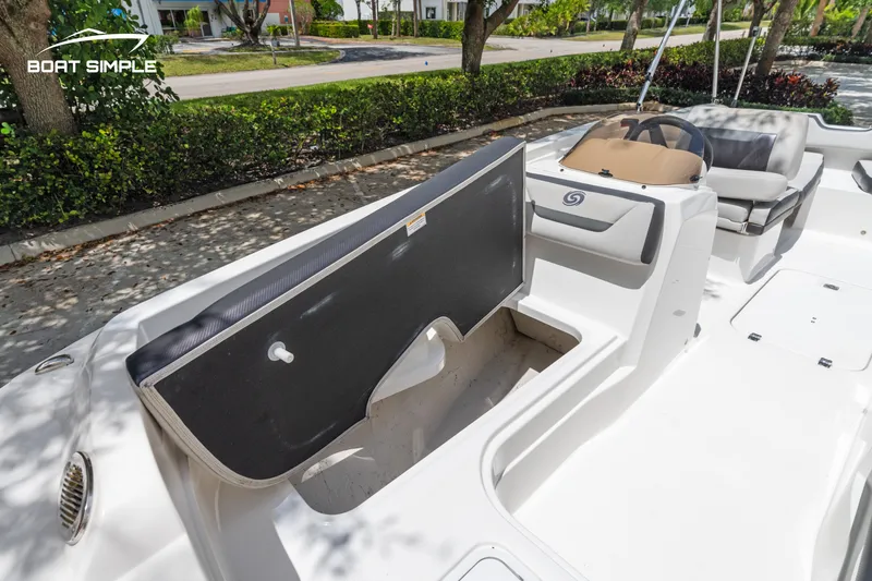 Slide: The Image of 2021 Hurricane SS 205 boat interior with seating and storage compartments. - 7