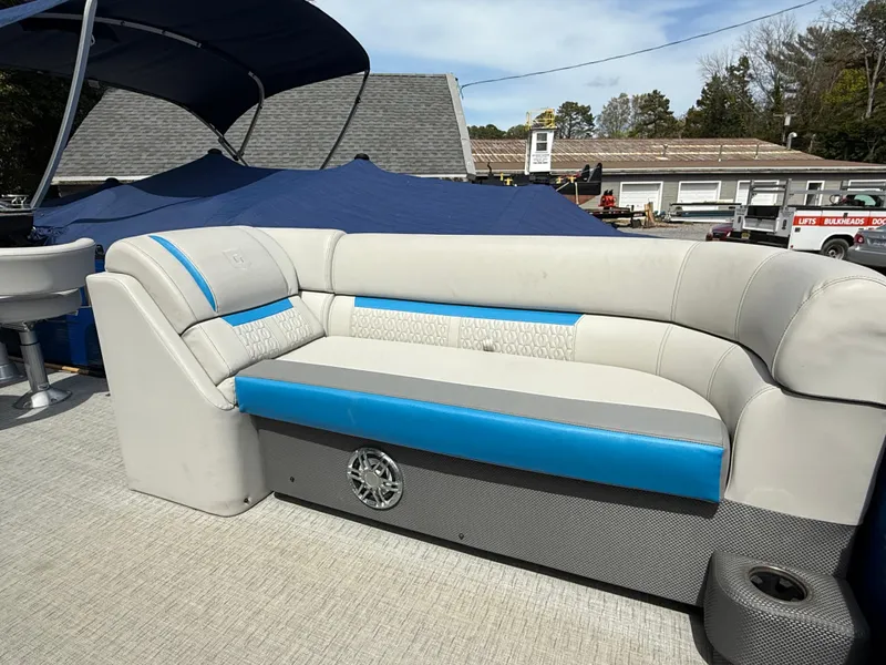 Slide: The Image of 2021 Godfrey SWEETWATER 2286 MT pontoon boat with blue and gray seating. - 8