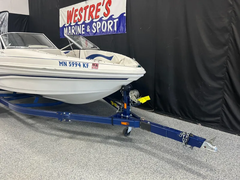 Slide: The Image of 2007 Larson 180 Sport boat on trailer at Westre's Marine & Sport showroom. - 1