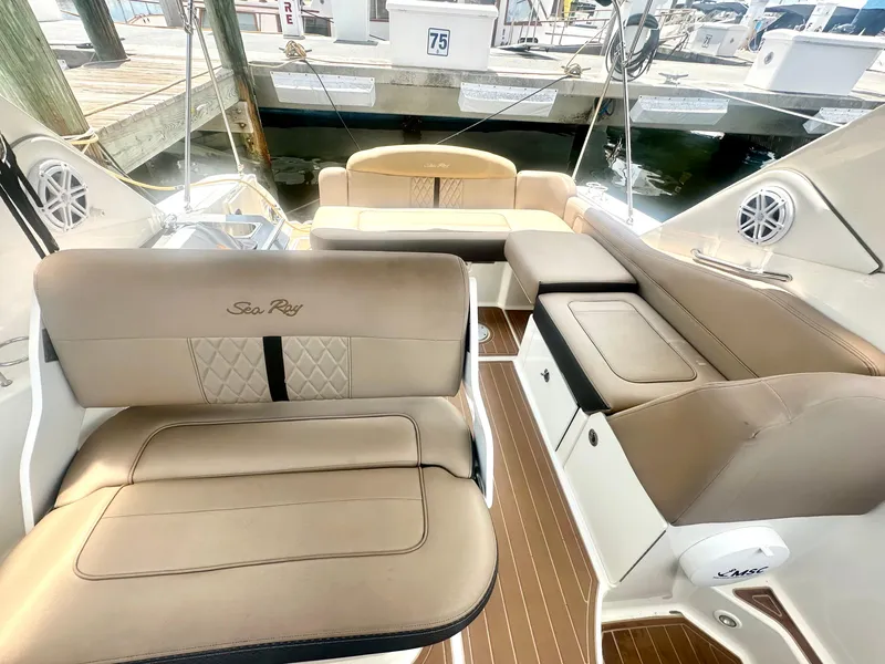 Slide: The Image of Luxurious interior of 2012 Sea Ray 310 Sundancer yacht with beige seating. - 16