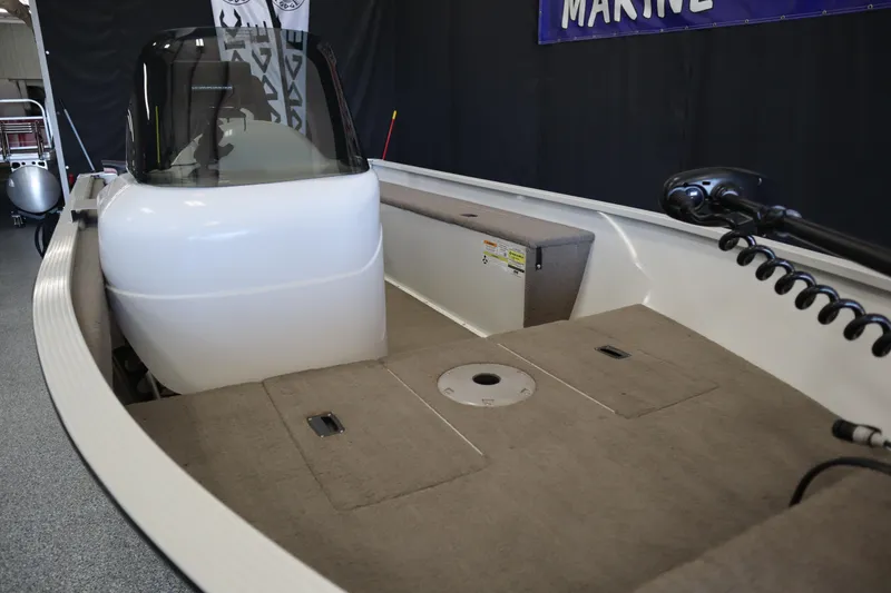 Slide: The Image of 2013 MirroCraft 1416 Troller boat interior with seating and control panel. - 9