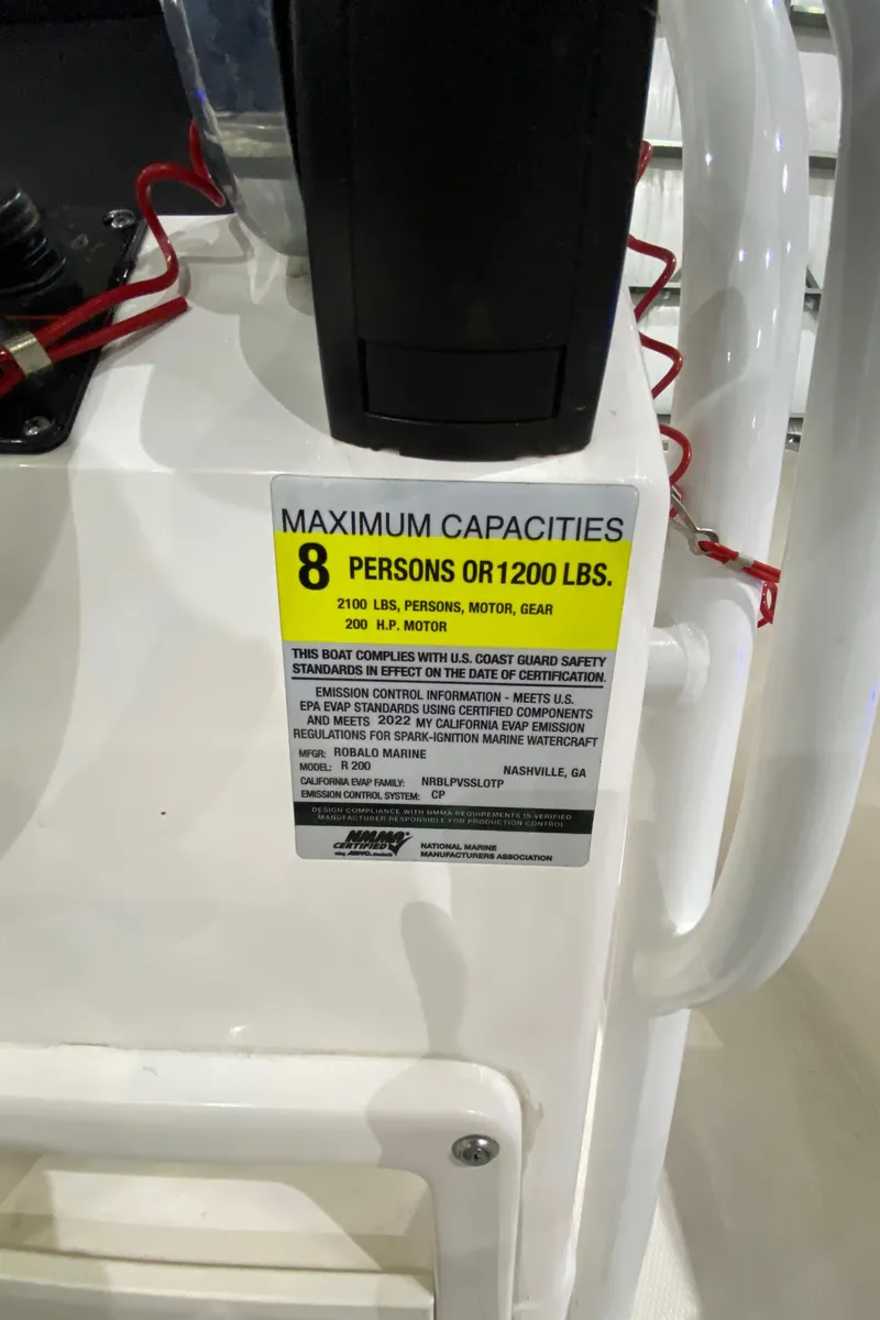 Slide: The Image of 2022 Robalo R200 Center Console capacity label, 8 persons or 1200 lbs limit. - 15