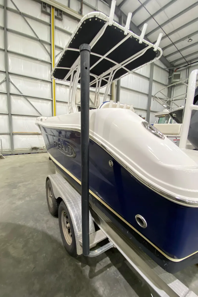 Slide: The Image of 2022 Robalo R200 Center Console boat on trailer in storage facility. - 6