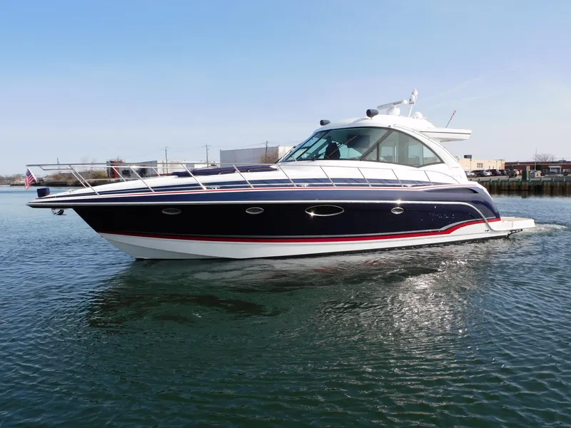 Slide: The Image of 2015 Formula YACHT 45 cruising on calm waters under a clear blue sky. - 0