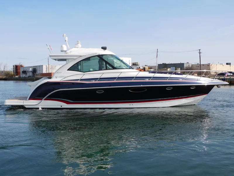 Slide: The Image of 2015 Formula YACHT 45 cruising on calm water under clear skies. - 10