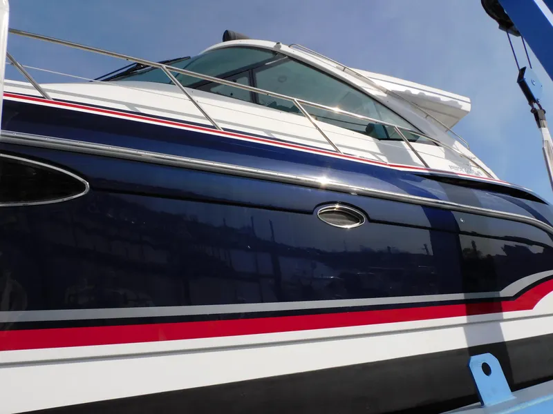 Slide: The Image of 2015 Formula YACHT 45 with sleek design and vibrant red, white, and blue accents. - 15