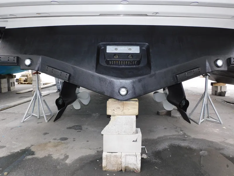 Slide: The Image of Rear view of 2015 Formula YACHT 45 on stands, showcasing propellers and hull details. - 22