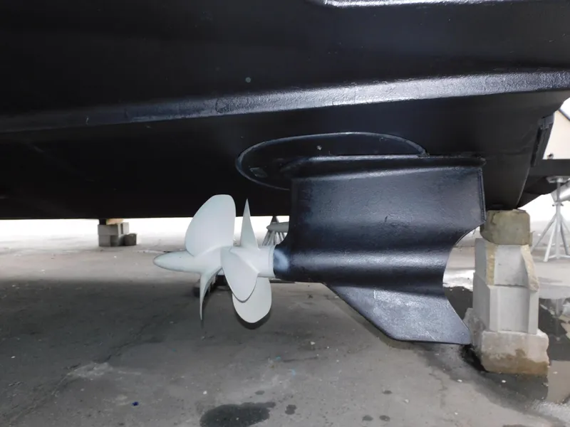 Slide: The Image of Propeller of 2015 Formula YACHT 45 on dry dock, showcasing underside details. - 24