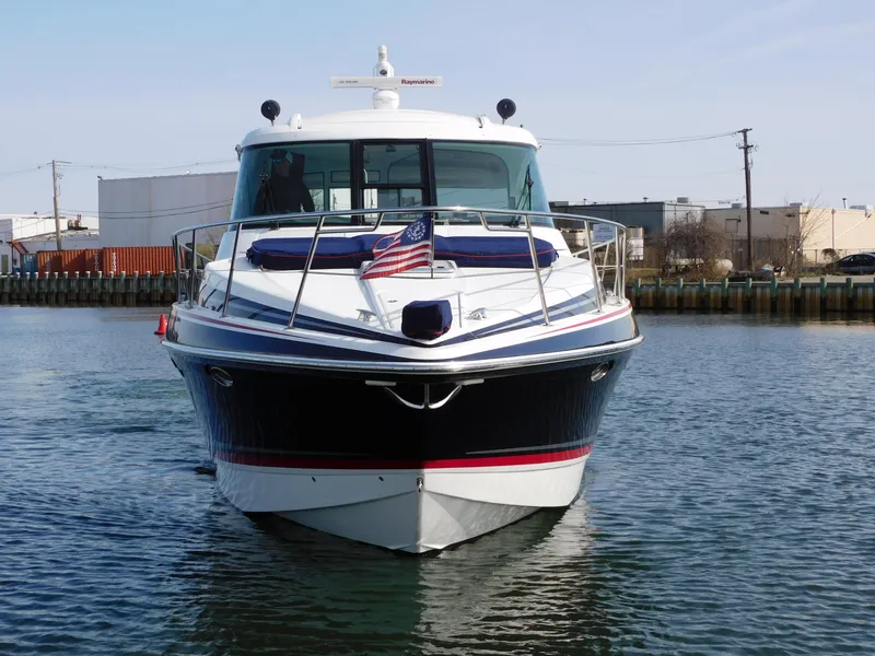 Slide: The Image of Front view of 2015 Formula YACHT 45 on water with American flag. - 3