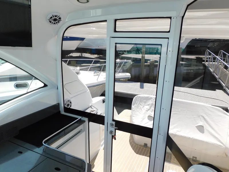 Slide: The Image of Interior view of 2015 Formula YACHT 45, showcasing sleek design and marina backdrop. - 37