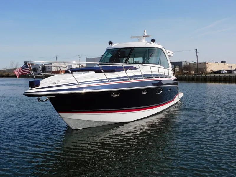 Slide: The Image of 2015 Formula YACHT 45 cruising on calm waters, showcasing sleek design and elegance. - 4