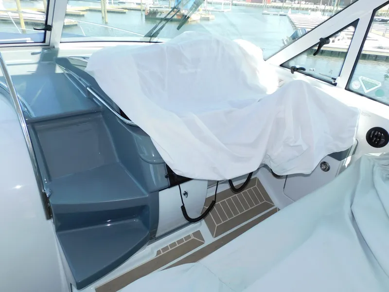 Slide: The Image of Interior of 2015 Formula YACHT 45, featuring covered seating and sleek design. - 43