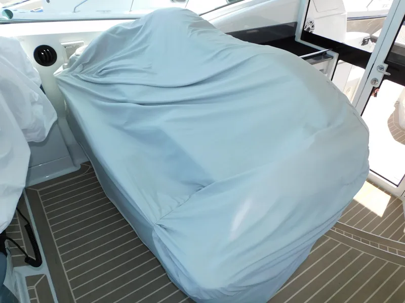 Slide: The Image of Covered seating area on a 2015 Formula YACHT 45, featuring sleek interior design. - 44