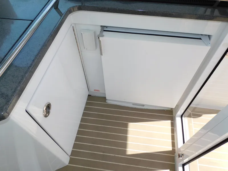 Slide: The Image of Interior view of 2015 Formula YACHT 45, featuring sleek cabinetry and modern design elements. - 45