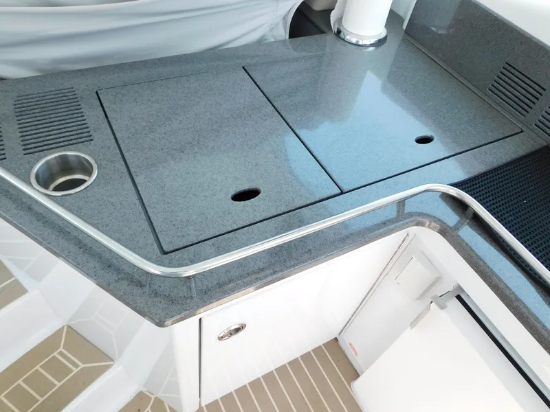 Slide: The Image of Modern kitchen area on 2015 Formula YACHT 45 with sleek countertops and integrated sink. - 49