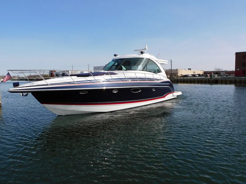 Slide: The Image of 2015 Formula YACHT 45 cruising on calm waters under a clear blue sky. - 5