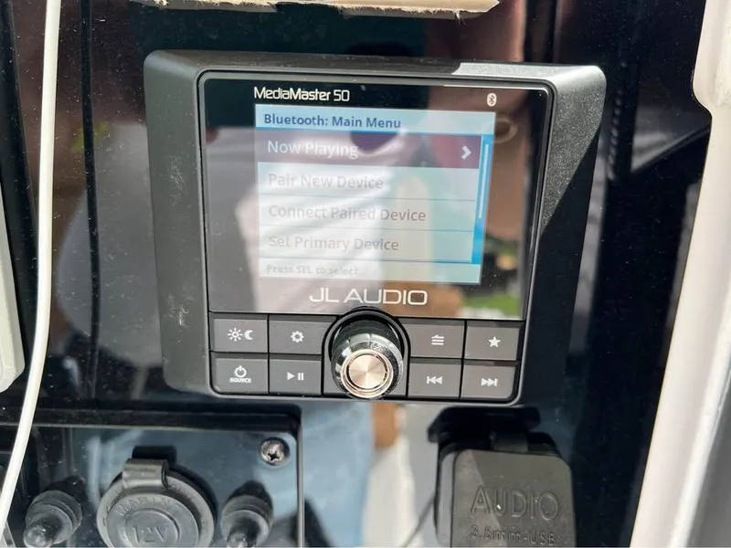 Slide: The Image of JL Audio MediaMaster 50 on 2022 Sea Hunt Gamefish 27, displaying Bluetooth menu. - 15