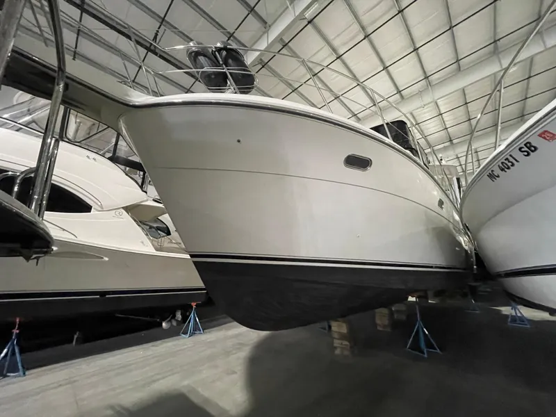 Slide: The Image of 1995 Carver 440 Aft Cabin Motor Yacht in storage, side view. - 3
