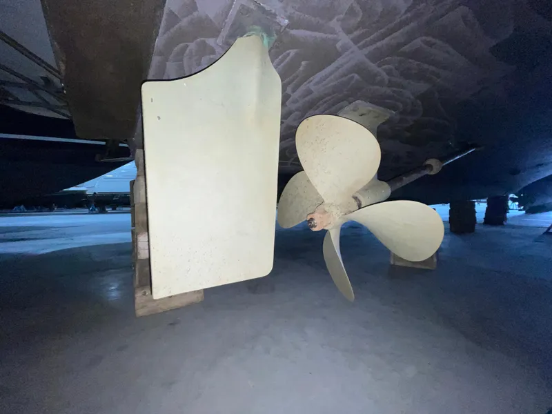 Slide: The Image of Propeller and rudder of 1995 Carver 440 Aft Cabin Motor Yacht on dry dock. - 6