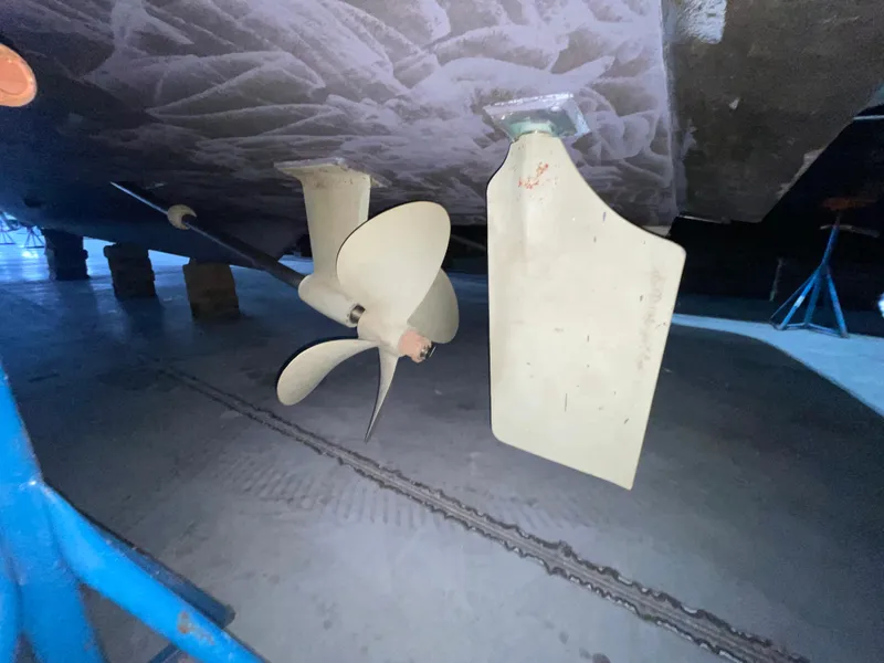 Slide: The Image of Propeller and rudder of 1995 Carver 440 Aft Cabin Motor Yacht in dry dock. - 7