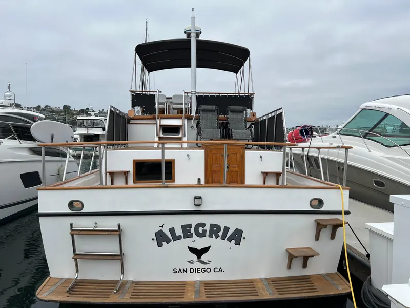 Slide: The Image of 1984 DeFever 41 Trawler "Alegria" docked in San Diego marina. - 2