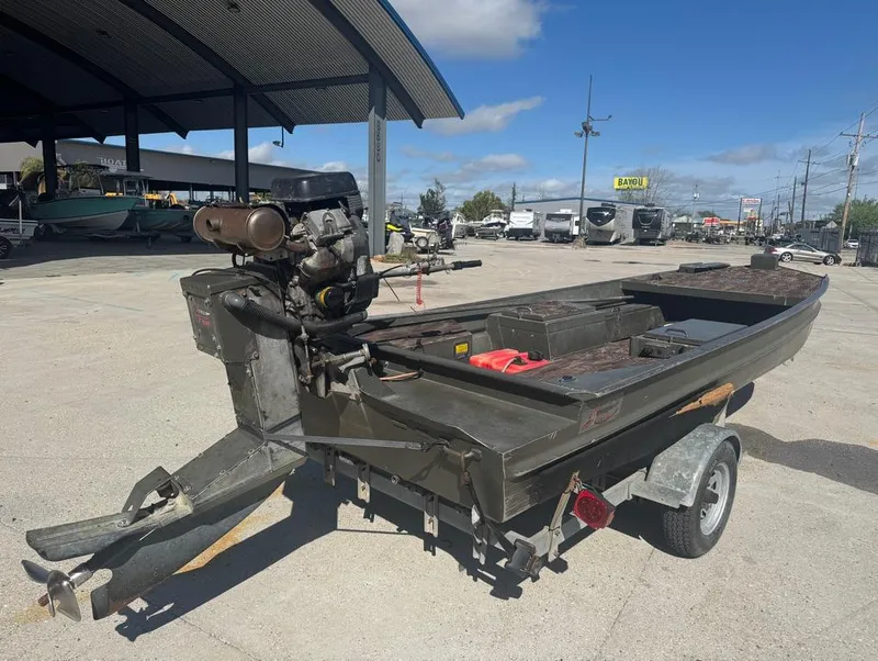 Slide: The Image of 2018 Go-Devil 18x48 Surface Drive Boat on trailer in outdoor lot. - 7