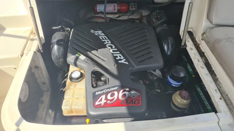 Slide: The Image of Engine compartment of a 2004 Sea Ray 270 Sundeck with MerCruiser 496 MAG engine. - 18