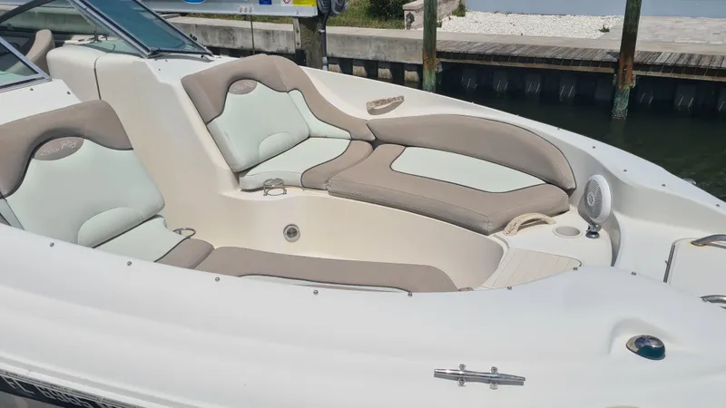 Slide: The Image of 2004 Sea Ray 270 Sundeck boat with spacious seating and elegant design. - 3