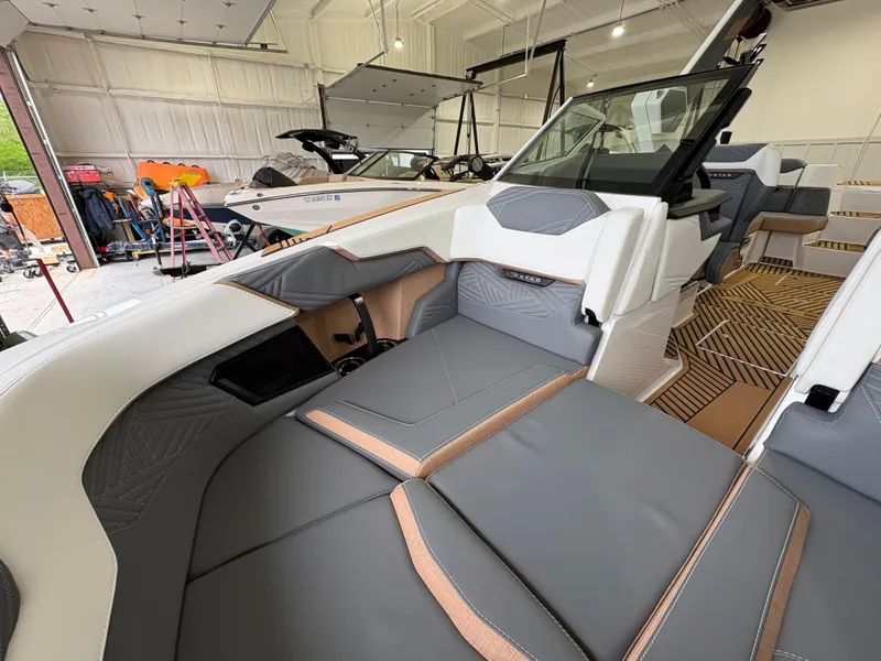 Slide: The Image of 2025 MasterCraft XStar 23 boat emblem with sleek design details. - 25