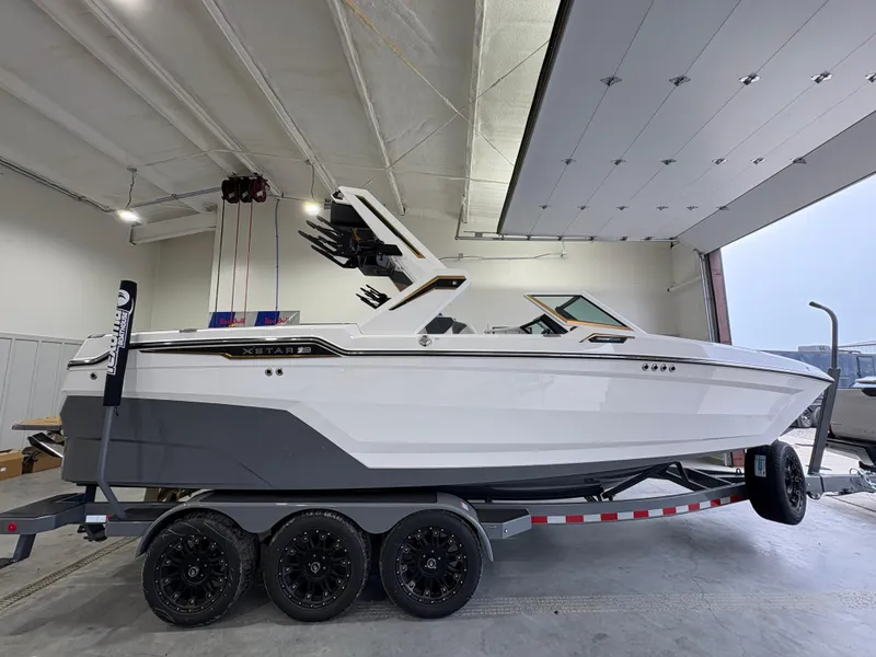 Slide: The Image of Engine compartment of 2025 MasterCraft XStar 23 with illuminated components. - 7