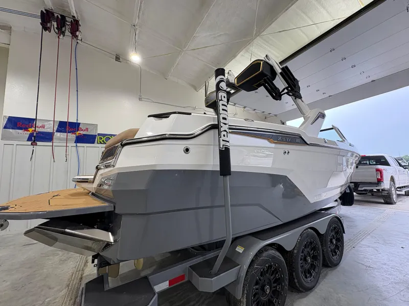 Slide: The Image of 2025 MasterCraft XStar 23 interior detail with sleek upholstery and storage compartment. - 8